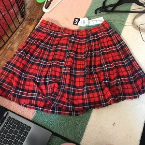 Large red and black plaid skirt